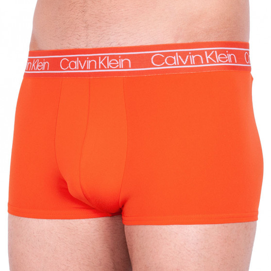 Pánské boxerky Calvin Klein oranžové (NB1886A-2ZE)