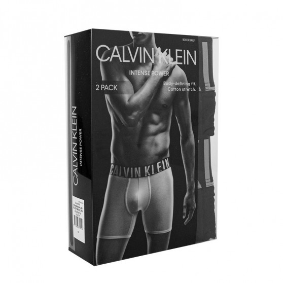 2PACK pánské slipy Calvin Klein černé (NB2601A-UB1)