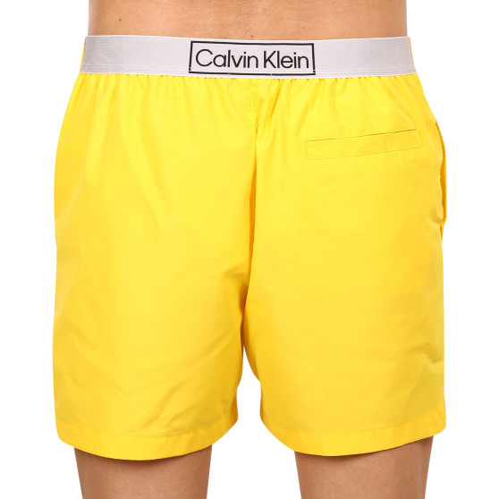 Pánské plavky Calvin Klein žluté (KM0KM00787 ZGR)