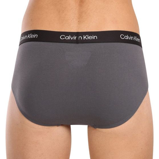 7PACK pánské slipy Calvin Klein vícebarevné (NB3581A-IUI)